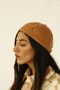 The fabric of this hat was found in Tokyo, Japan. The design of this beanie was inspired by the street style, art and architecture of Japan. INGREDIENTS 100% cotton corduroy Unisex Ethically made in Ecuador. Sustainable fashion, handmade, natural fibers, vintage textiles and upcycled materials.