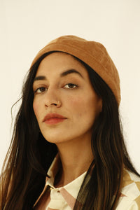 The fabric of this hat was found in Tokyo, Japan. The design of this beanie was inspired by the street style, art and architecture of Japan. INGREDIENTS 100% cotton corduroy Unisex Ethically made in Ecuador. Sustainable fashion, handmade, natural fibers, vintage textiles and upcycled materials.