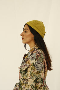 The design of this beanie was inspired by the street style, art and architecture of Japan. Beanie made with leftover green corduroy fabric from our previous collections. INGREDIENTS 100% cotton corduroy Unisex Ethically made in Ecuador. Sustainable fashion, handmade, natural fibers, vintage textiles and upcycled materials.