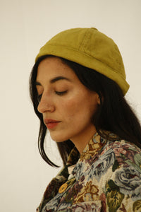 The design of this beanie was inspired by the street style, art and architecture of Japan. Beanie made with leftover green corduroy fabric from our previous collections. INGREDIENTS 100% cotton corduroy Unisex Ethically made in Ecuador. Sustainable fashion, handmade, natural fibers, vintage textiles and upcycled materials.