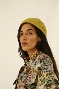 The design of this beanie was inspired by the street style, art and architecture of Japan. Beanie made with leftover green corduroy fabric from our previous collections. INGREDIENTS 100% cotton corduroy Unisex Ethically made in Ecuador. Sustainable fashion, handmade, natural fibers, vintage textiles and upcycled materials.
