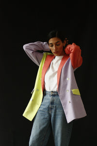 The fabric of this garment was found in Osaka, Japan. The design was inspired by the street style, art and architecture of Japan. The bold colors in this blazer are inspired in the works of art of Yayoi Kusama and Okamoto Shinjiro. INGREDIENTS 100% linen Mother of pearl buttons (concha de nacar) Ethically made in Ecuador sustainable fashion, handmade, natural fibers, vintage textiles and upcycled materials.